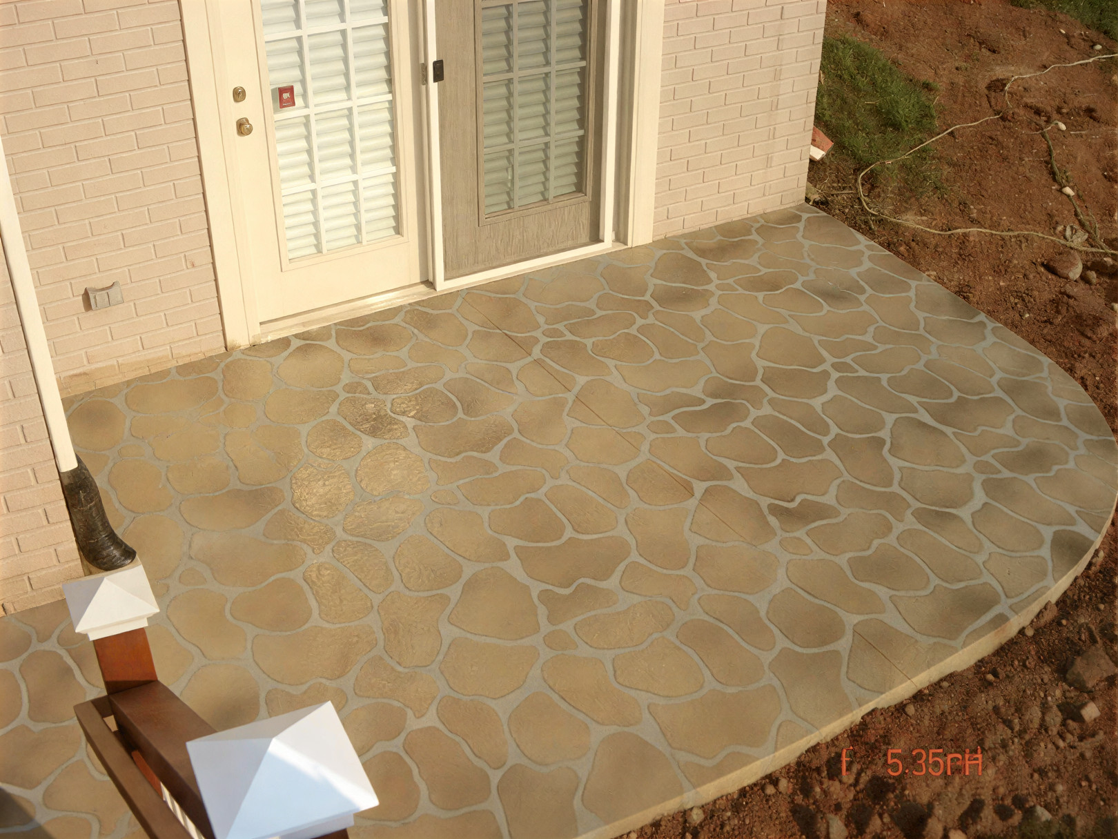 sun-acid stained concrete resodential entryway in Austin, TX