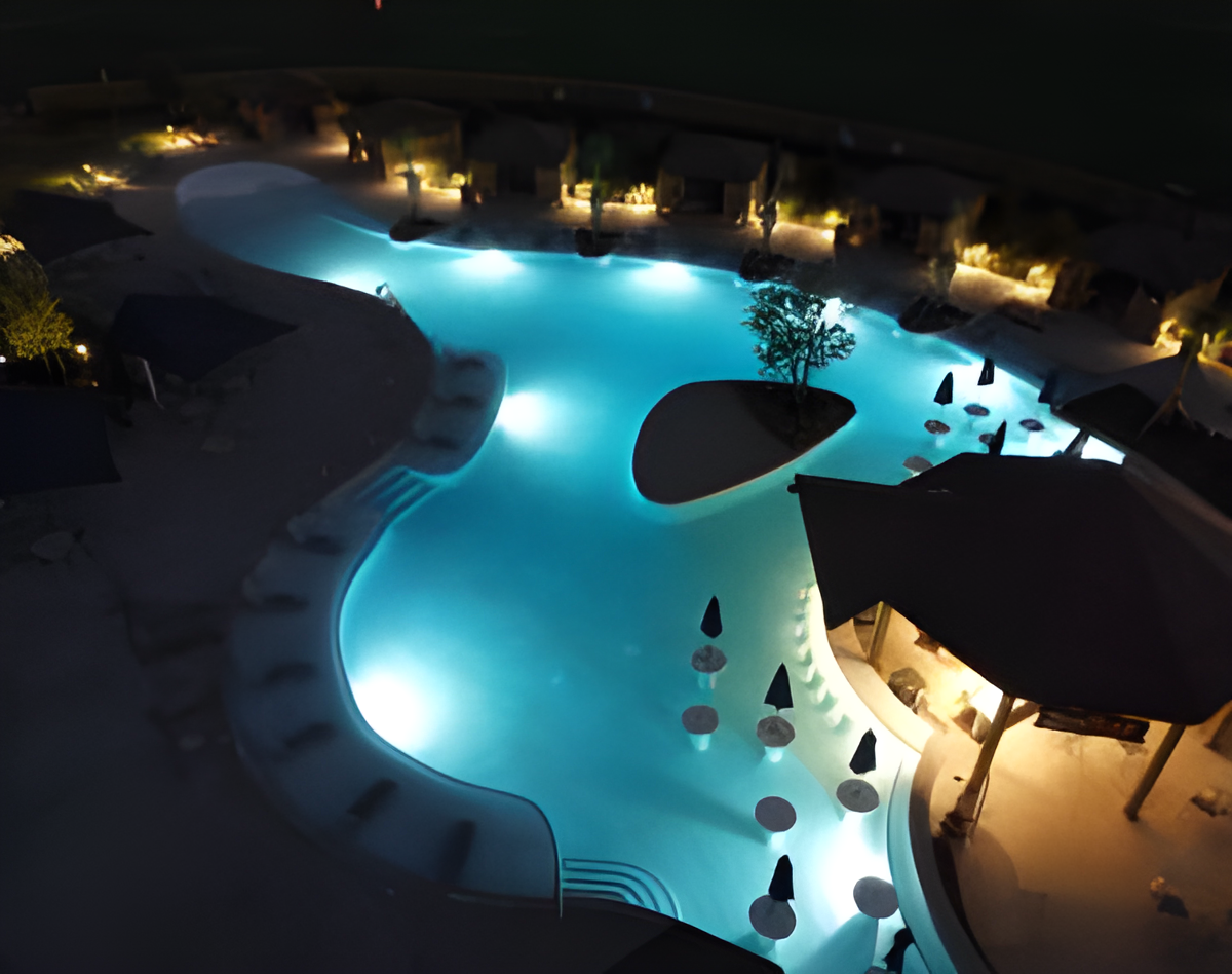 classic texture swimming pool deck with lights in Austin, TX