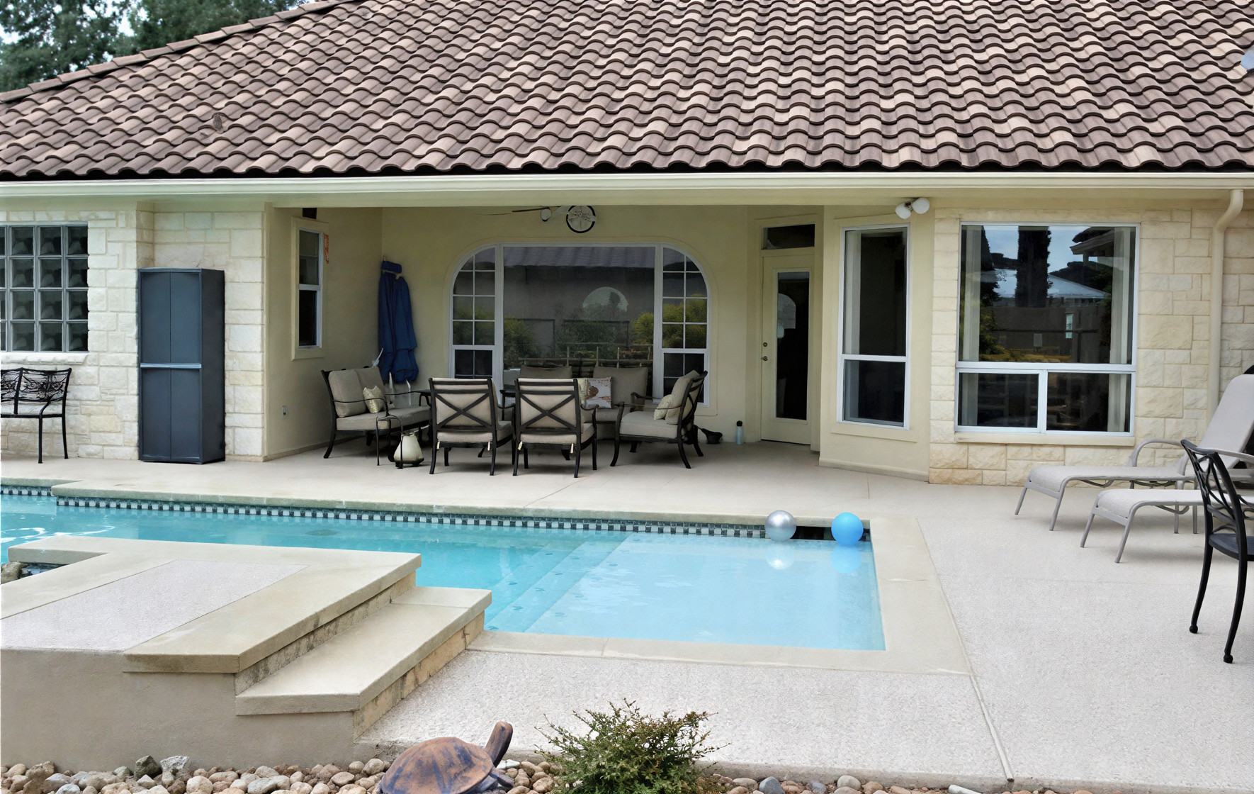 textured coating residential swimming pool in Austin, TX