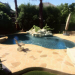 stamped concrete pool deck w/ stained flooring in Austin, TX